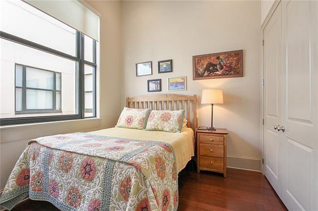 quiet cozy bedroom with big side wall closet on right