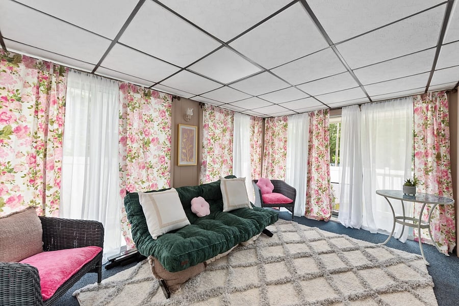 Sunroom/funroom with flat screen TV, Futon, chairs and table - we use it as the kids playroom or flex space just to hang out and relax.