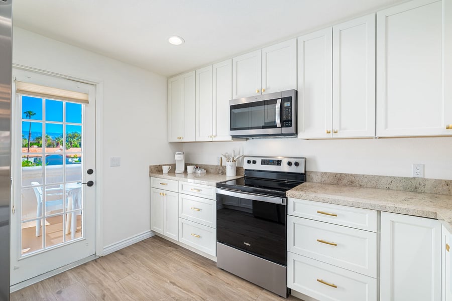 Enjoy seamless access to the patio, perfect for savoring your meals while soaking in the stunning desert views. 