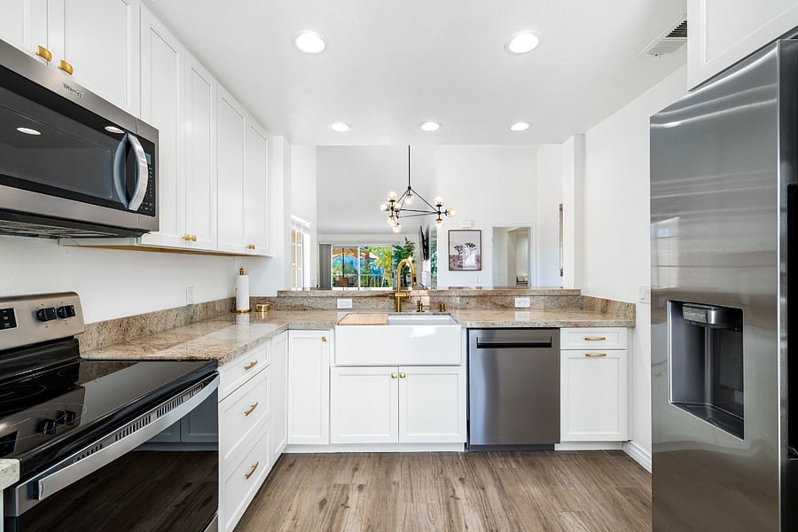 Welcome to our newly renovated kitchen! With a charming farm sink and modern appliances, its a delightful space for cooking and gathering. Whether youre preparing a feast or a quick snack, we cant wait for you to make it your own! Enjoy!