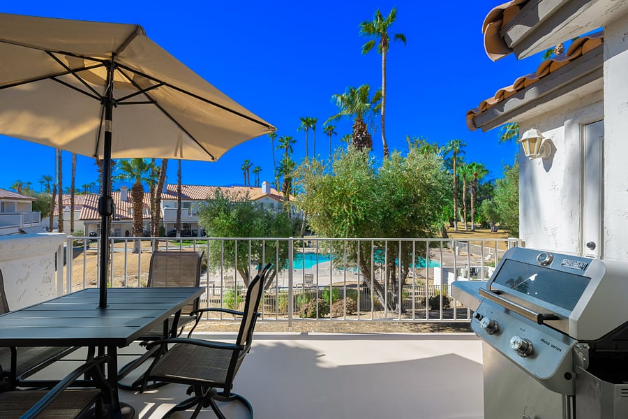 Welcome to our patio, where an inviting umbrella provides shade as you relax and enjoy pool and mountain views! This tranquil spot is perfect for sipping your morning coffee or unwinding with a drink in the evening.