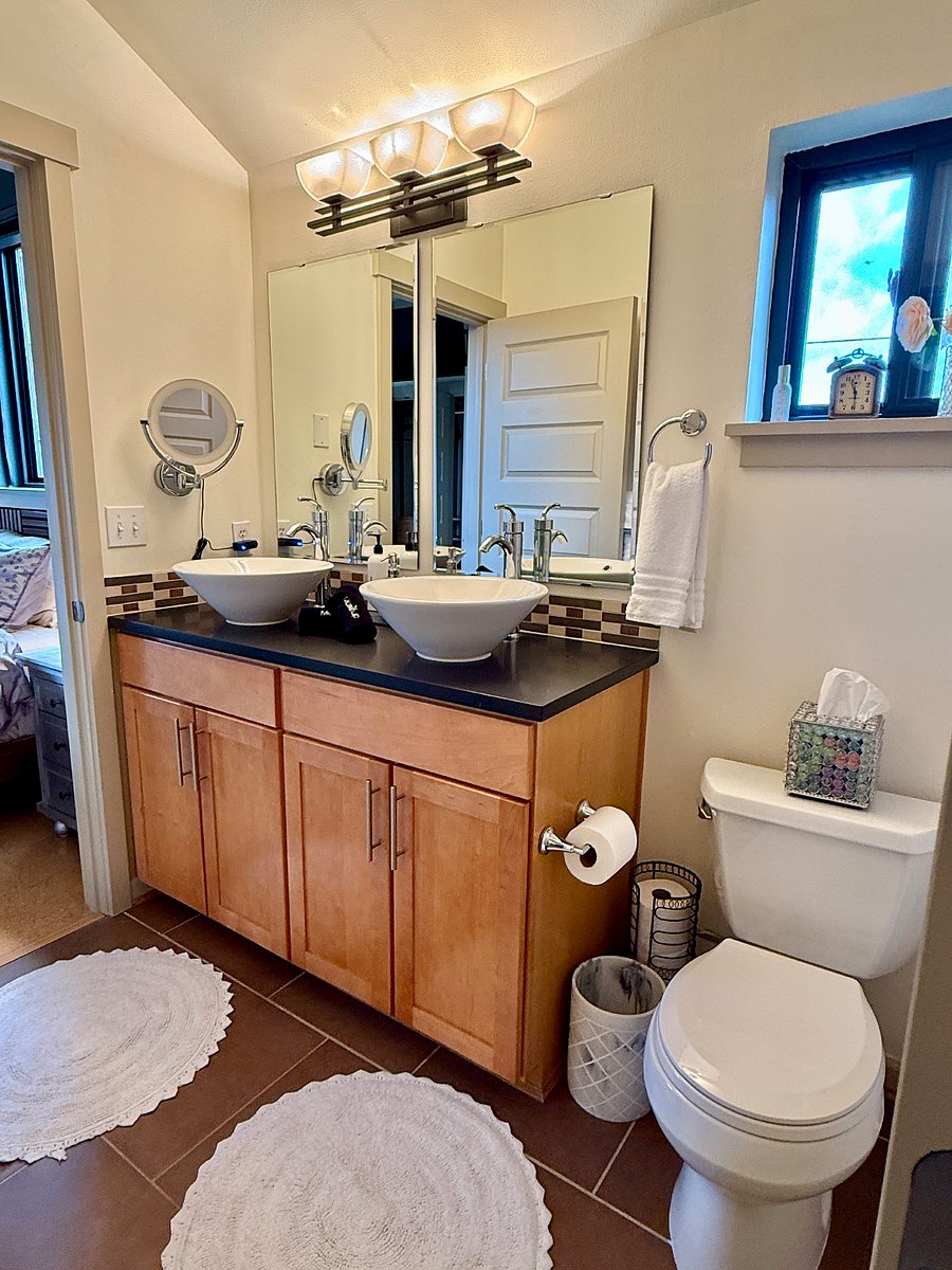 Upstairs Full Bathroom with combo tub/shower & dual sink vanity