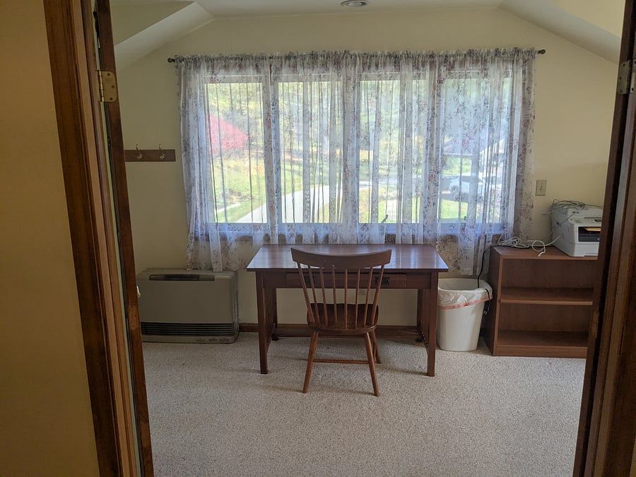 Second Room upstairs. Currently set up as an office. Excellent wifi access. Full beds or queen bed can be added to make this a fourth bedroom. This room is approx 8x25. Very bright with windows on each end + large window above desk.