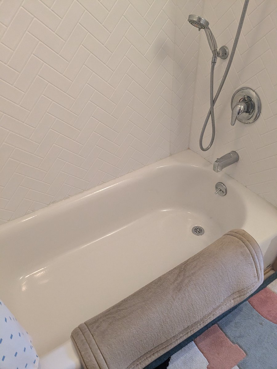 Upstairs bathroom New bathtub with shower option Note there is a second bathroom on the first floor.