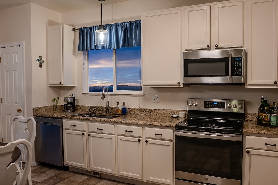 Granite Countertops in the kitchen and unobstructed views.