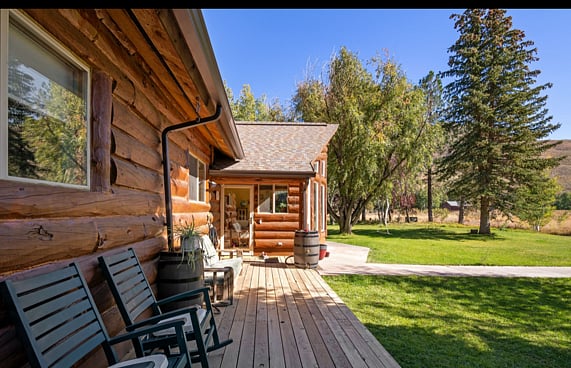 looking east along front deck into front door