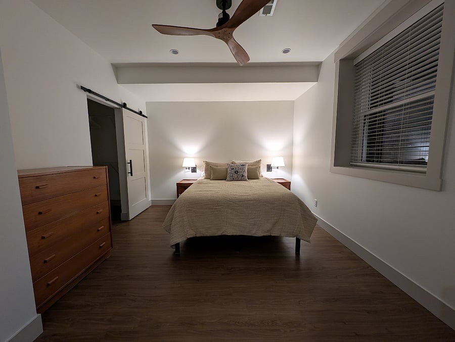 Large bedroom with new, comfortable queen bed