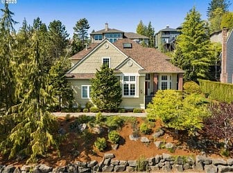 my home located in a serene setting on a private street and lots of walking paths in the forest heights neighborhood! Coffee shops, shopping, restaurant close by!