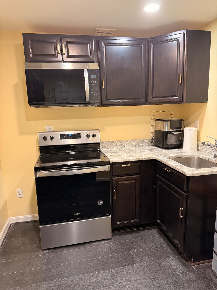 Kitchen -Dark Wood Cabinets & Granite Countertops