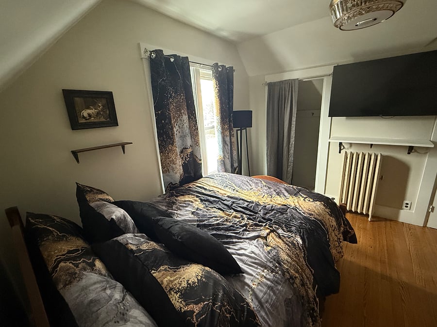 Spacious room with two closets, 48" Smart TV, Dresser, Loveseat that converts to have foot rest or twin sleeper. Private in room refrigerator.