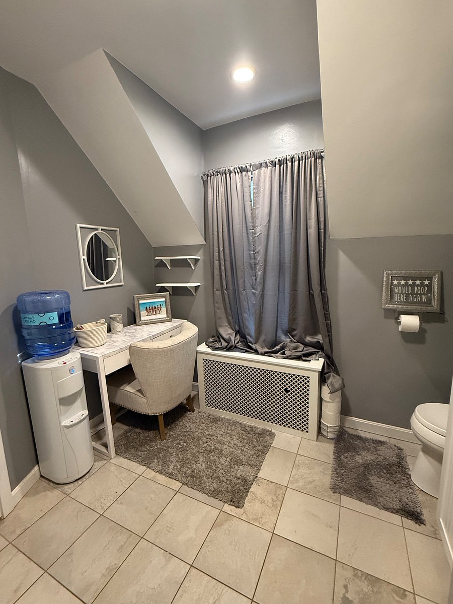 Second vanity with mirror to prepare for your day. Spring water cooler.