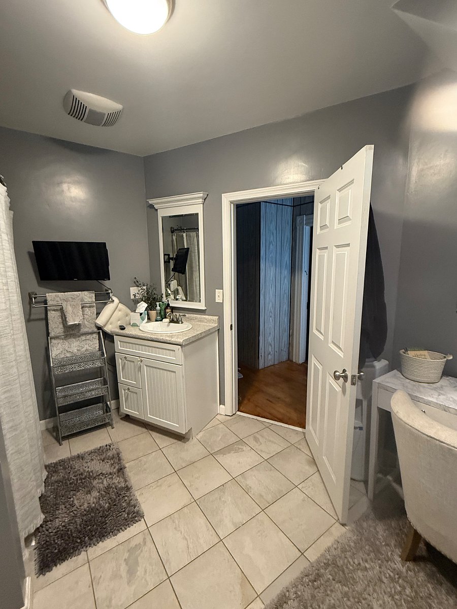 Two vanities with mirrors