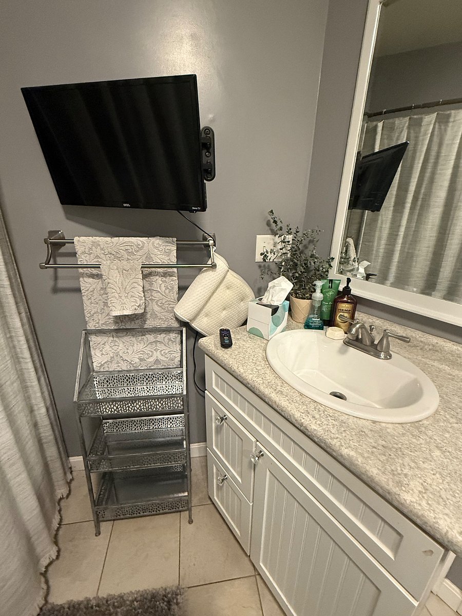 TV available to watch as you relax in a soaking bath after long day at work.