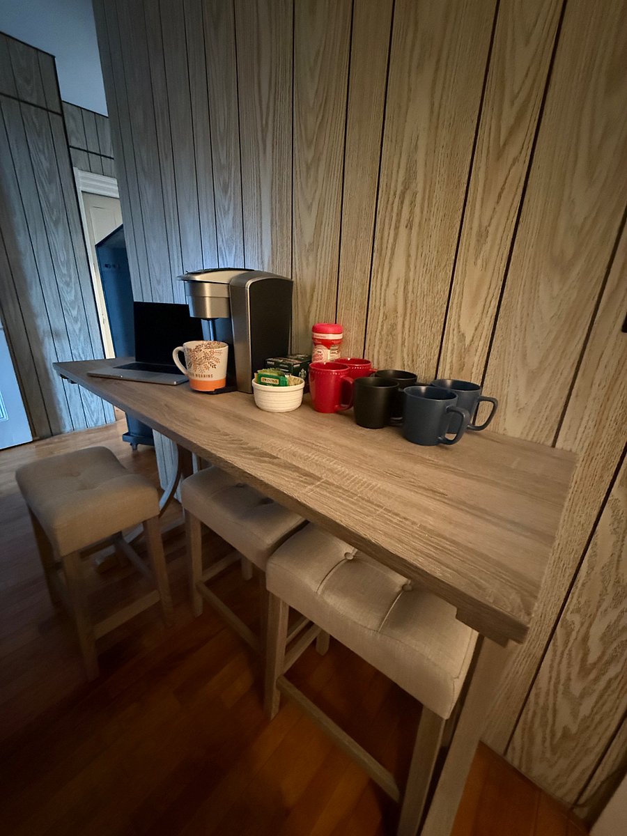 A shared coffee and breakfast snack hightop table is conveniently located on the second floor, making it easy for you to prepare for your workday.