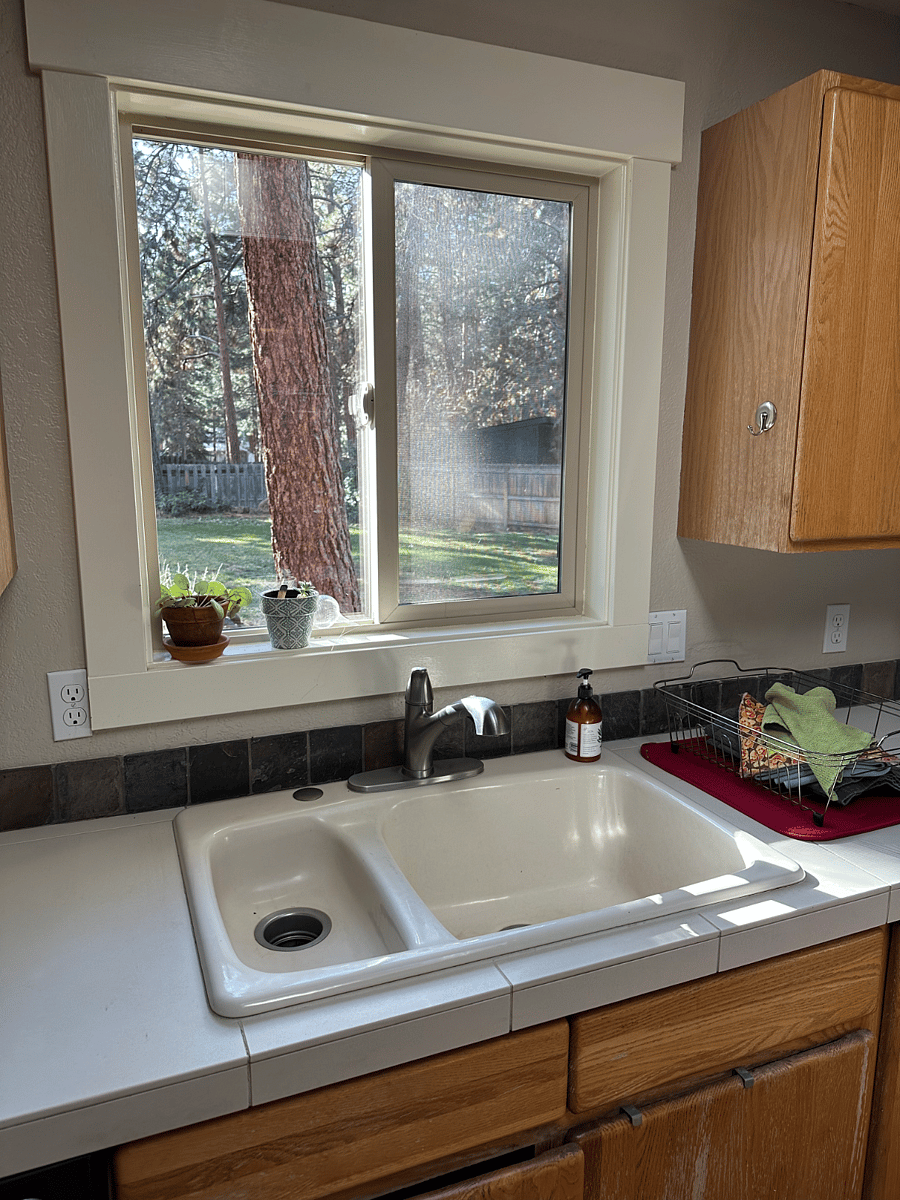 Kitchen sink and view into backyard