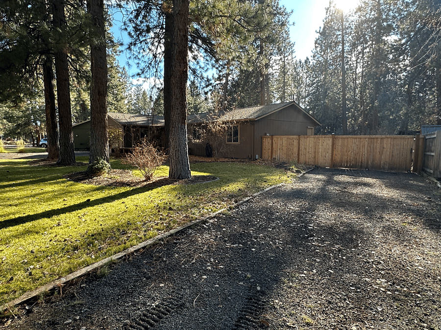 Second driveway, with access to backyard through rolling gate.