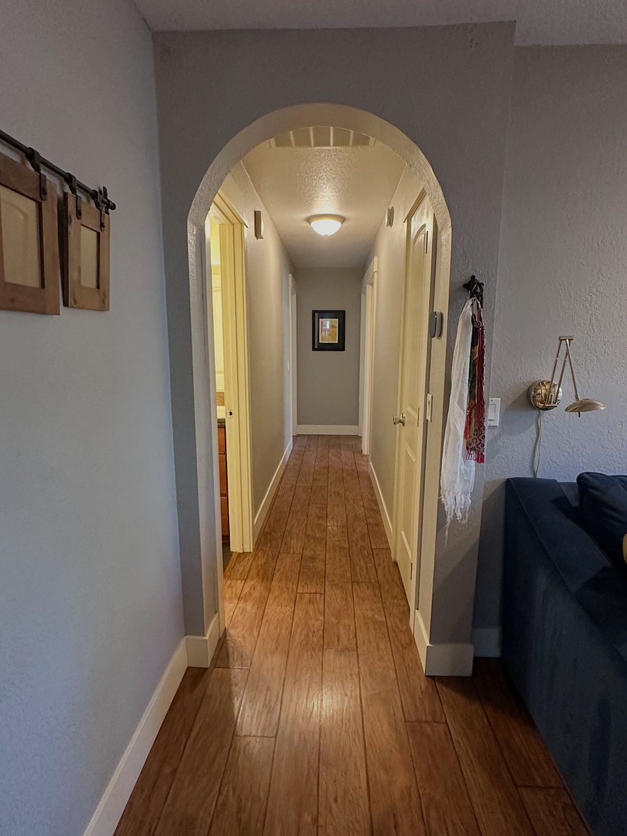 Hallway. Guest bathroom on left. Linen closet on the right. Master bed down the hall on left, second bedroom and office down the hall on the right.
