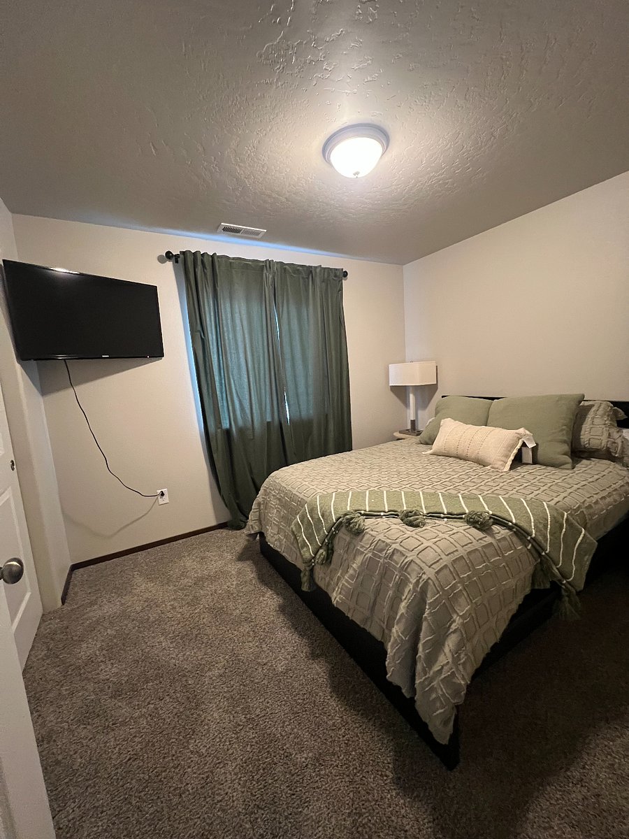 Bedroom #2 with comfortable queen size bed. Two night stands, Two side table lamps with On/Off switch and Plug in receptacles for easy phone or accessories charging 