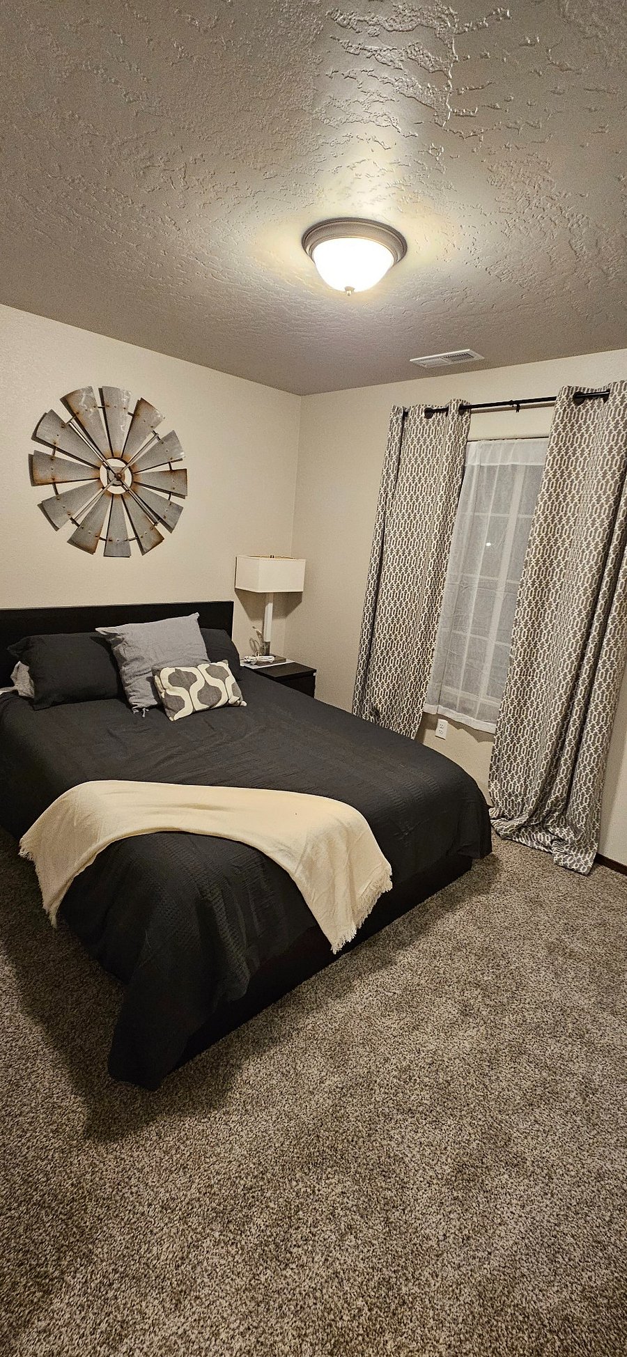 Bedroom #3 with comfortable queen size bed. Two night stands, Two side table lamps with On/Off switch and Plug in receptacles for easy phone or accessories charging 