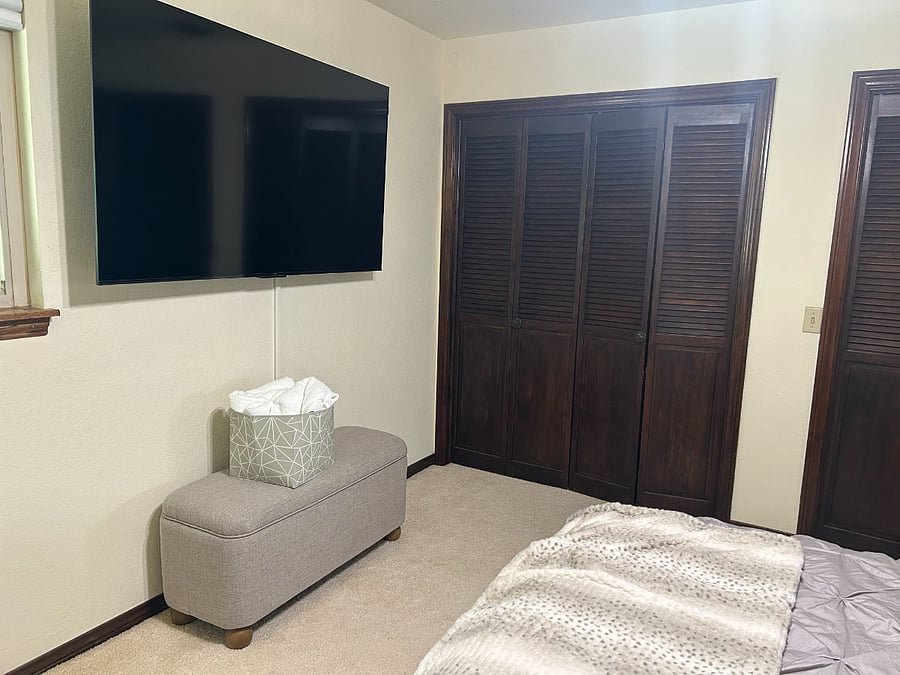 Bedroom #2 -Large TV and window.