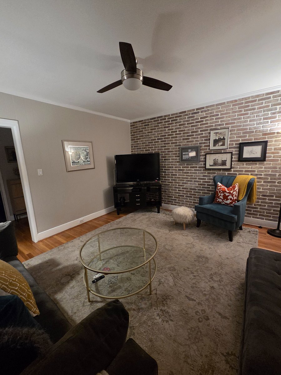 Living Room with Exposed Brick Wall