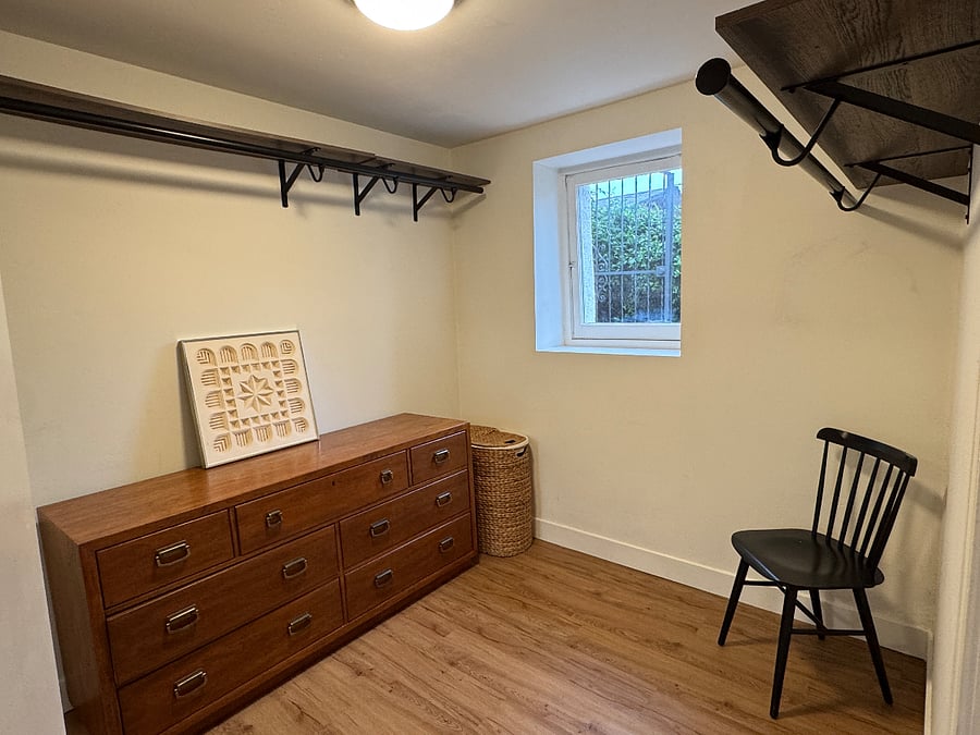 Walk in closet with drawer storage