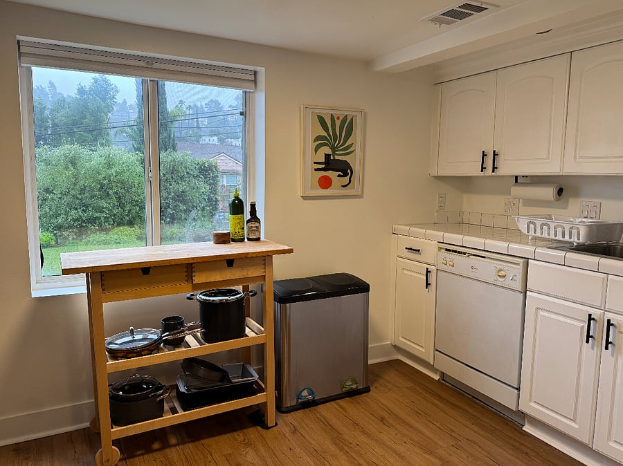 Kitchen, complete with kitchen essentials, dishwasher