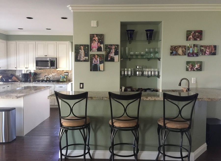 Breakfast bar and kitchen with plenty of counter space for meal prepping.
