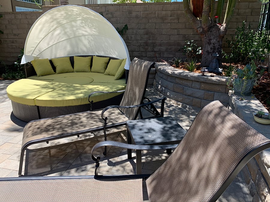 Plenty of places to sit outside in the backyard and soak up the sun or just relax. 
