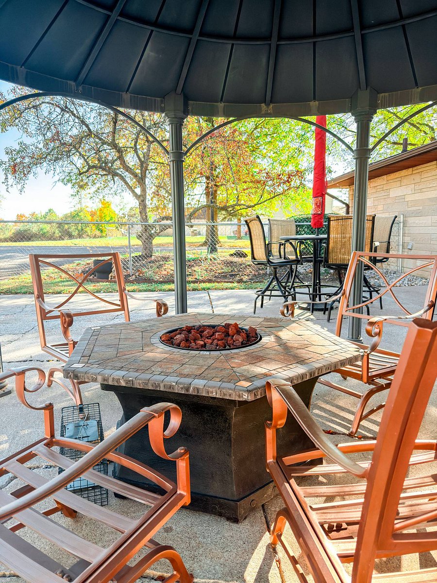 Fire pit under a gazebo.