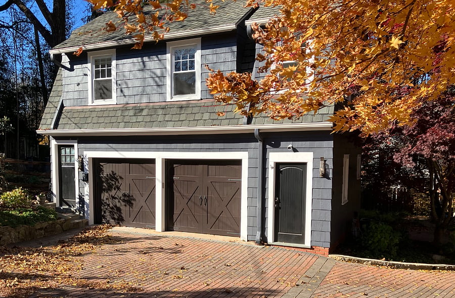 Apartment is on the second floor of owner's detached garage with private entrance and off street parking behind.
