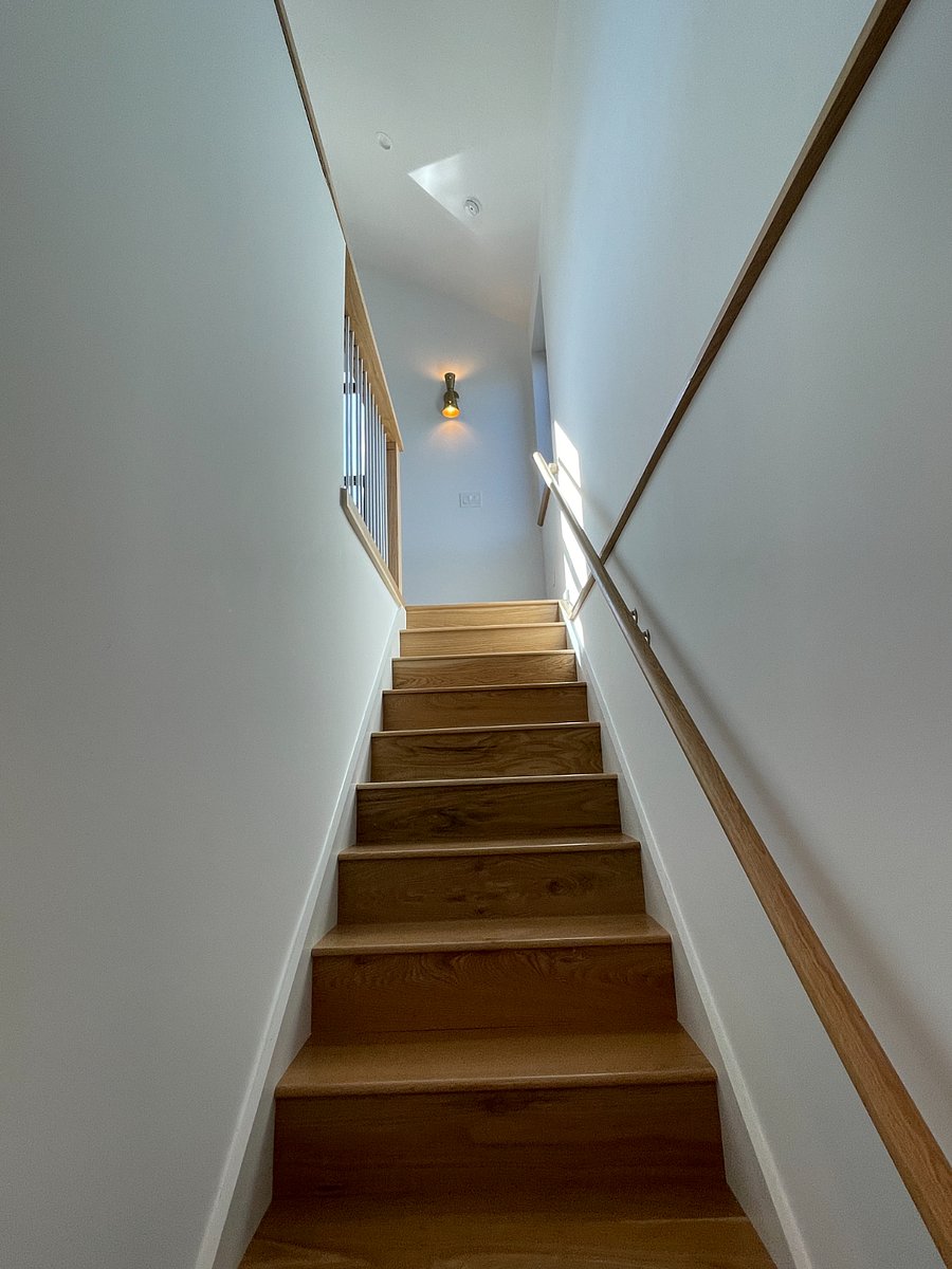 Stairs up to sleeping and lounging area