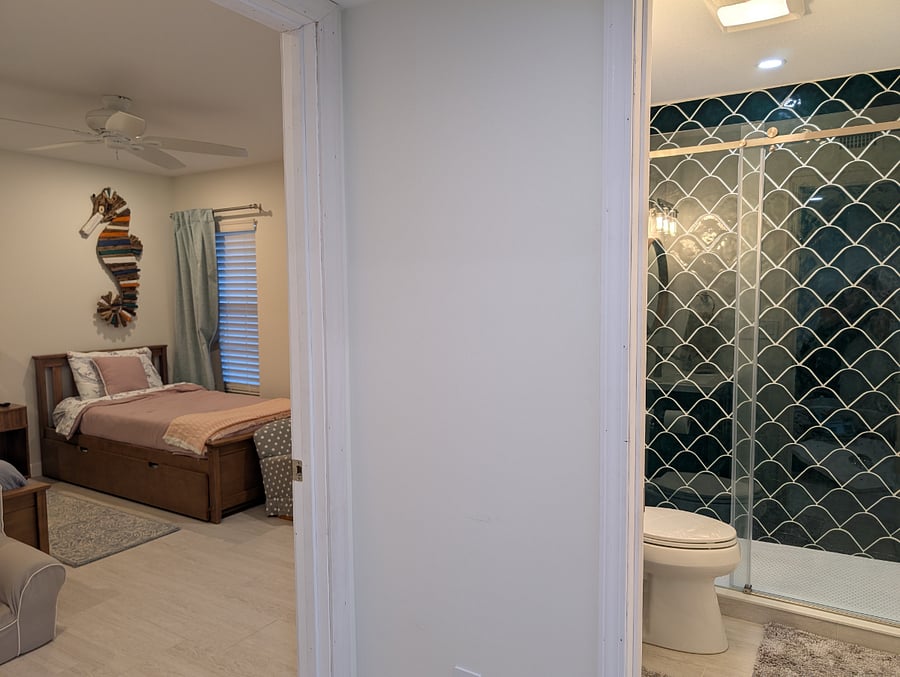 View looking into the second bedroom from the hallway