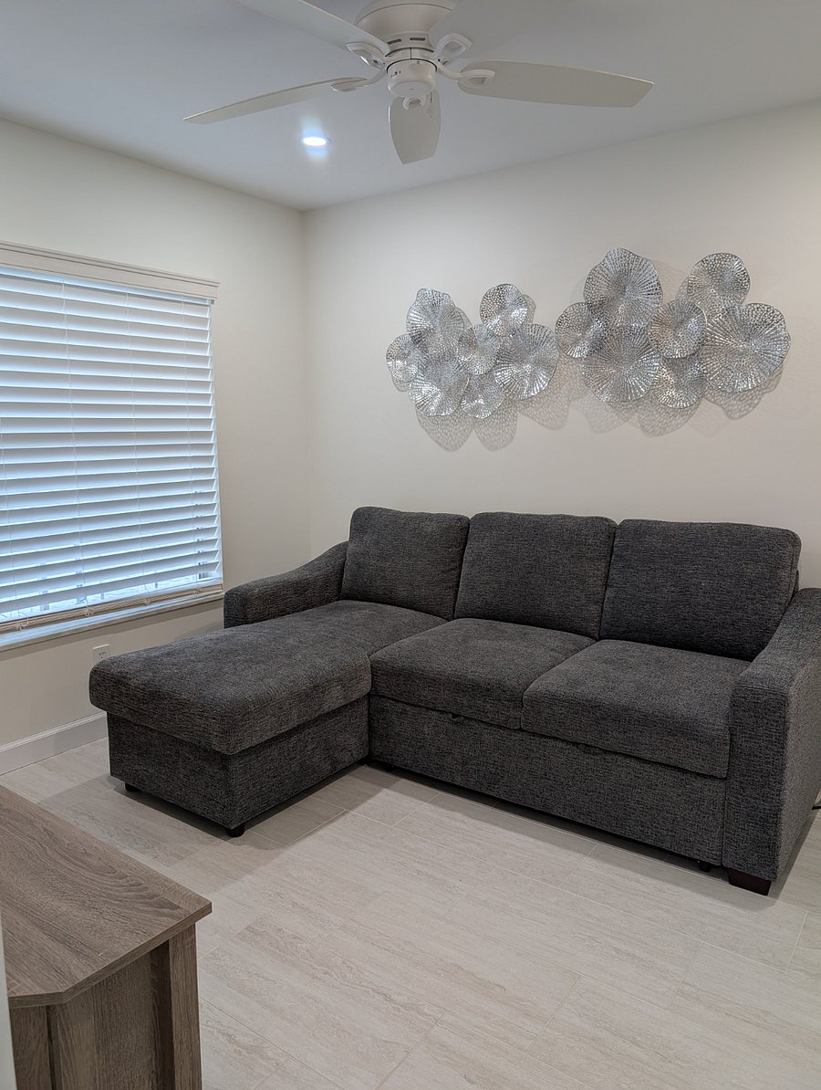 Bonus Flex room off main living area- could be used as an office, guest sleep space, game room, etc. currently has a pull out couch (queen size), mounted smart TV and console. Great canal views!
