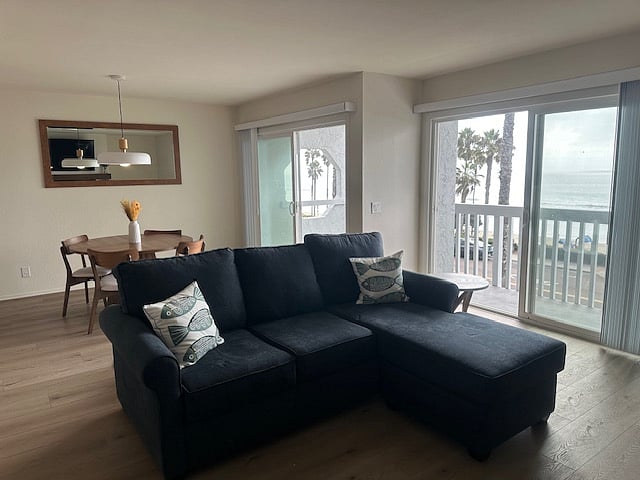 Large sliders with balcony for ocean viewing and to enjoy the ocean breeze 