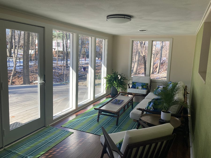 Four season room offers a wonderful view of the private back yard.