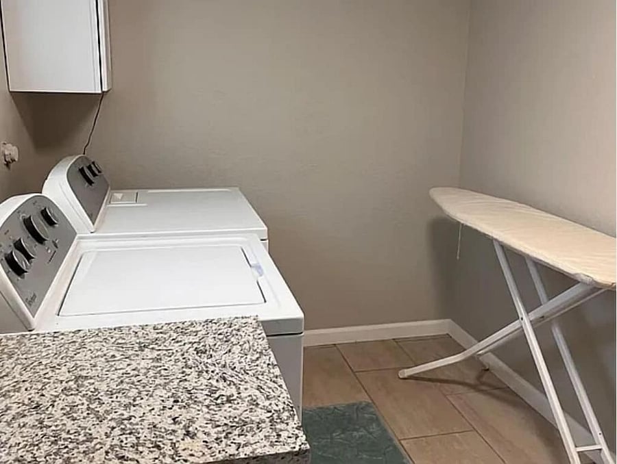 Full-size washer & dryer, ironing board, and iron to get your week ready for success.