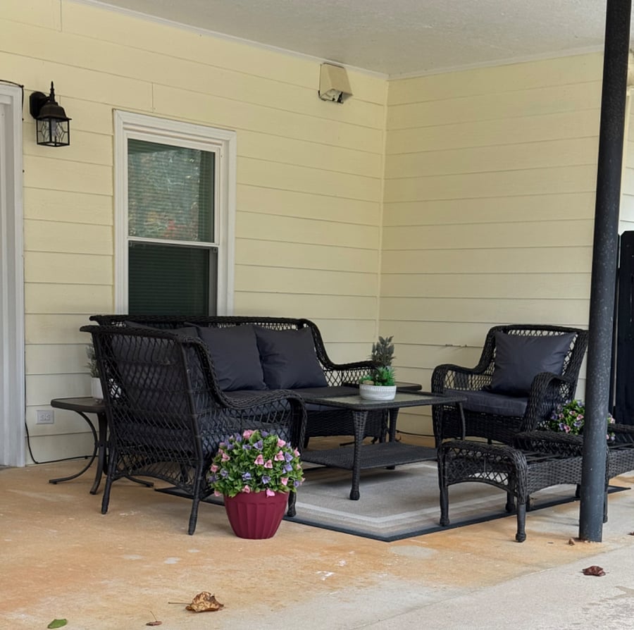 Covered Patio - comfortable sofa and chairs that overlook tranquil lake