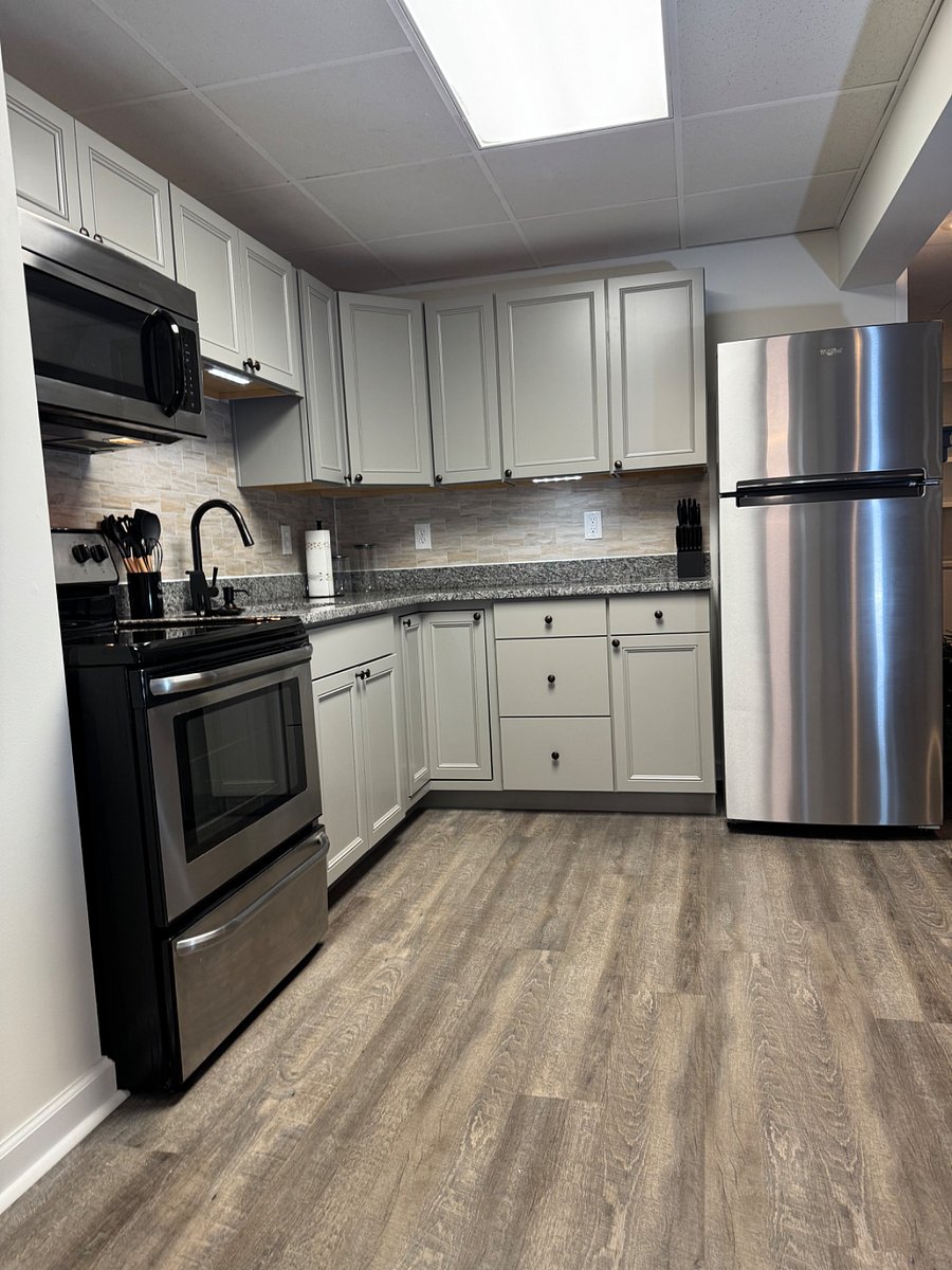 Kitchen - full sized refrigerator, oven, and microwave