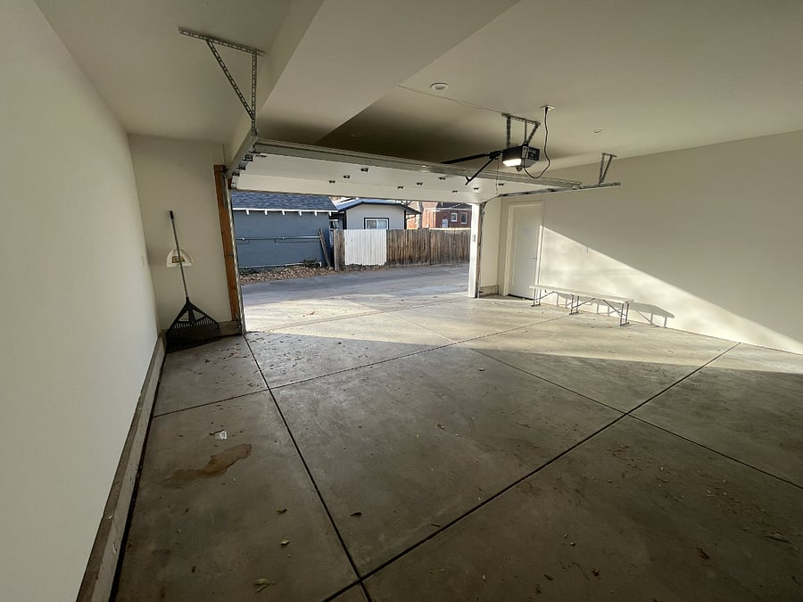 Private two car garage right under the unit. Exits to alley.