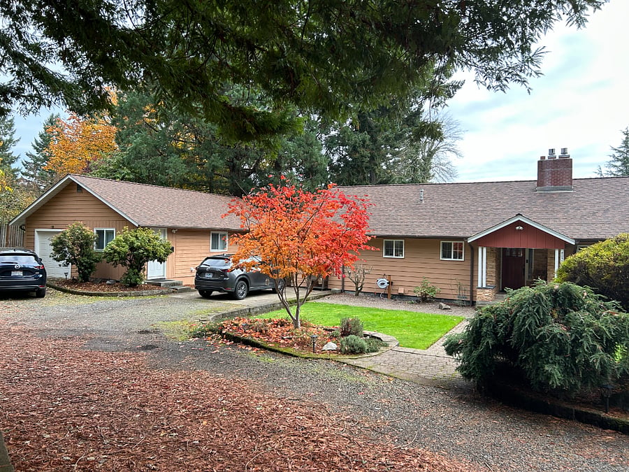 Apartment located in building on the left, main house on right. 