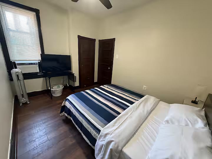 Room 5, 3rd Floor, Queen Bed, Small Closet Space, & Smart TV