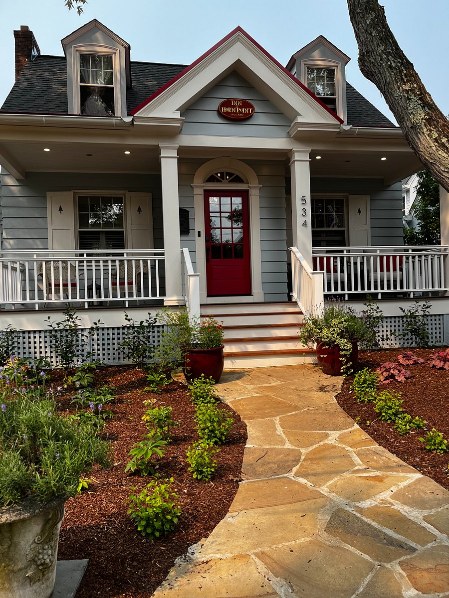Landscaped path draws you into our quintessential front porch ...