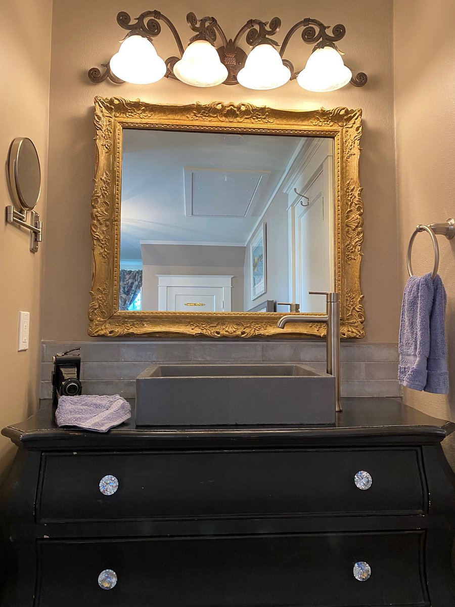 An en-suite european style sink sits apart from the shower/toilet, so each person can get ready in privacy.