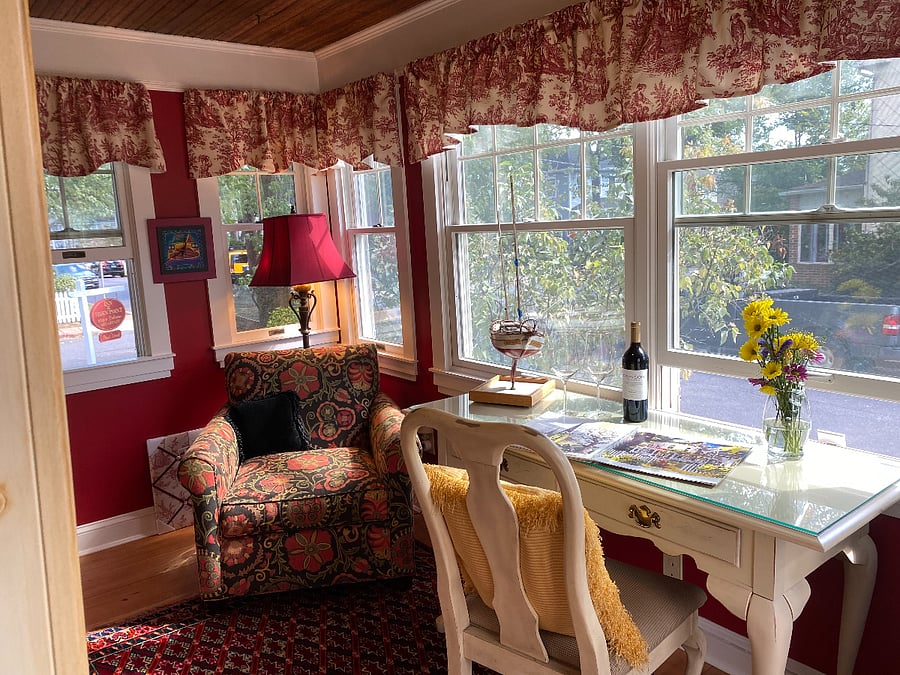 Sunroom/Office with dedicated desk.