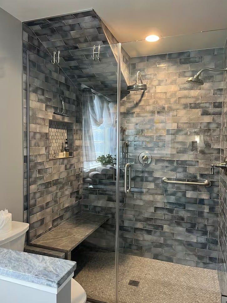 ... primary bathroom has a dual showerhead with an additional handheld shower spray. Rain, traditional or hand held ... your choice!
