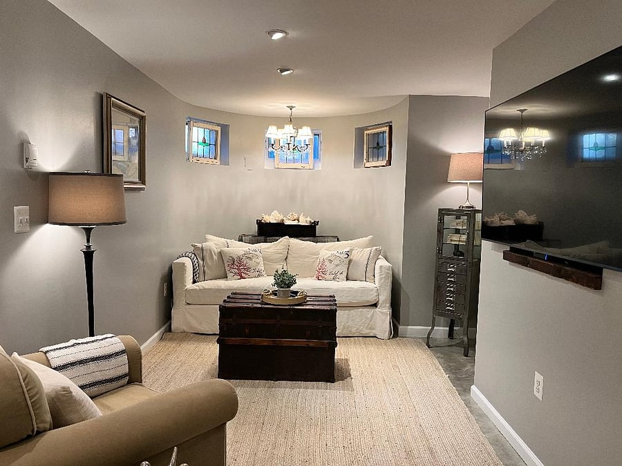 Lovely sitting/living room with TV. This is located right off the kitchen area.