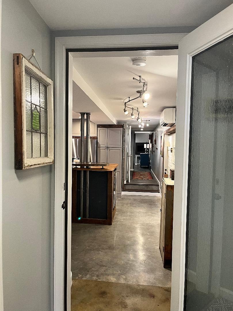 View from the entranceway to the apartment. The apartment has heated concrete floors and 2 mini-splits for AC.