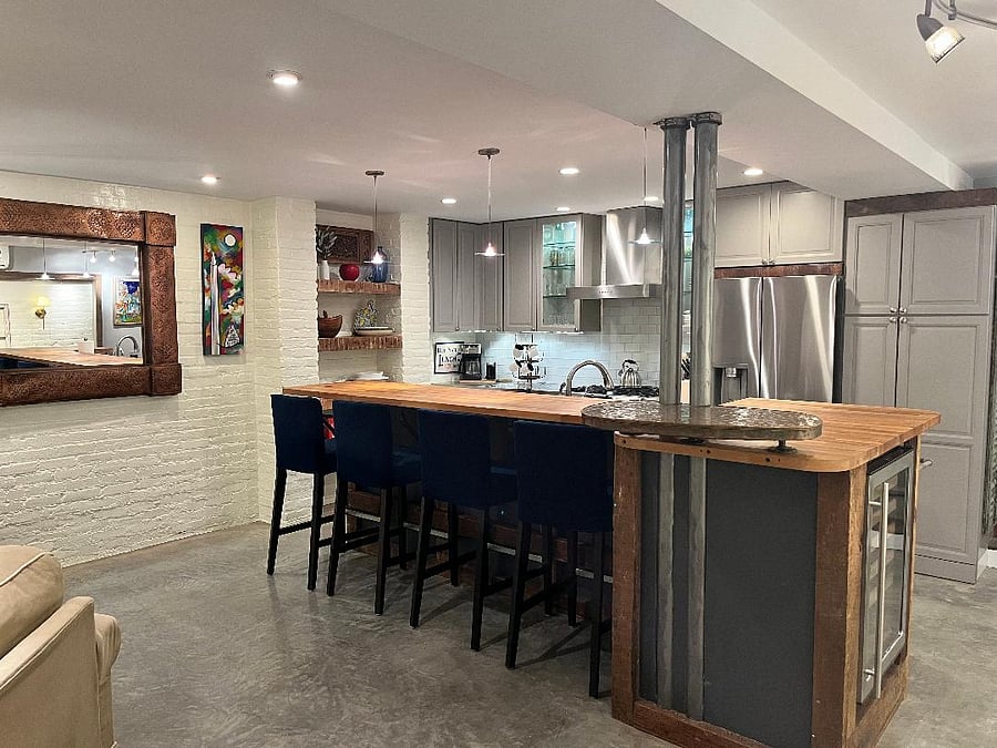 Dine in Kitchen Island, butcher block countertop and wine fridge.