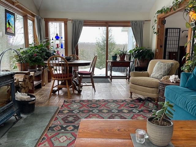 Looking west. Outside the sliding glass door is a large deck for enjoying the warmth of the spring sun.